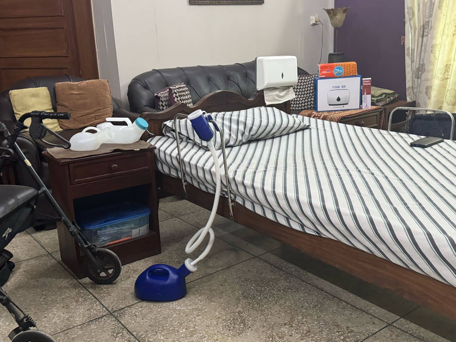A real ND Facility bedside urine bottle setup in a home bedroom